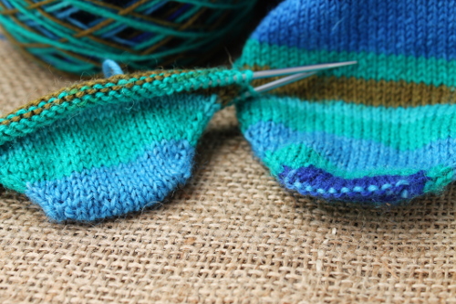 Wonky sock on the right, the perfect toe on the left...