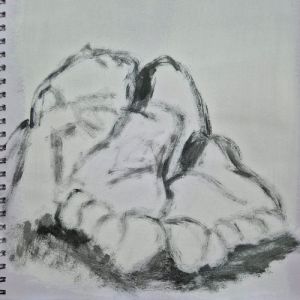 a figure drawing using acrylic paint in a sketchbook. The feet are the most prominent part of the drawing.